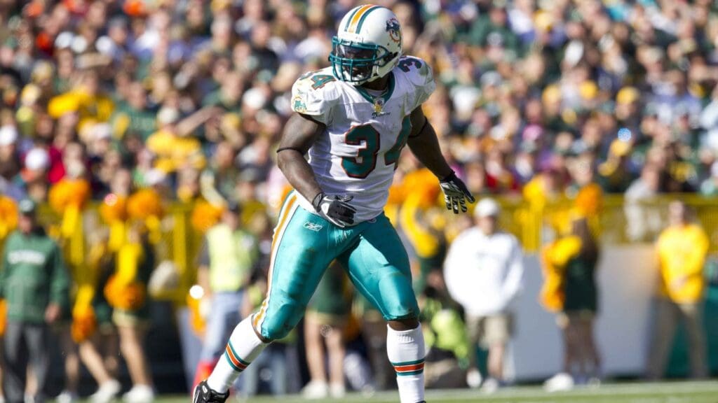 Sep 21, 2010; Green Bay, WI, USA; Miami Dolphins running back Ricky Williams (34) during the game against the Green Bay Packers at Lambeau Field. The Dolphins defeated the Packers 23-20.