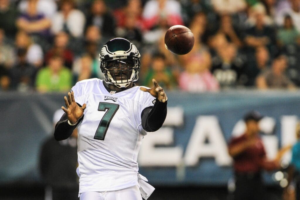 Aug 15, 2013; Philadelphia, PA, USA; Philadelphia Eagles quarterback Michael Vick (7) throws a pass in the second quarter of the game against the Carolina Panthers at Lincoln Financial Field.