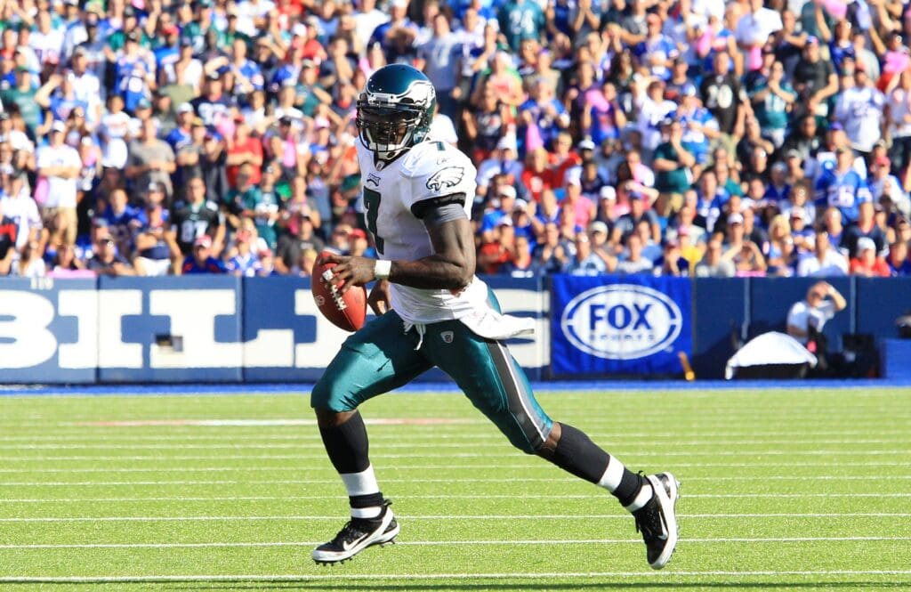 Oct 9, 2011; Orchard Park, NY, USA; Philadelphia Eagles quarterback Michael Vick (7) rolls out against the Buffalo Bills during the fourth quarter at Ralph Wilson Stadium. Bills beat the Eagles 31 - 24