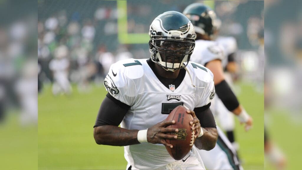 Aug 9, 2013; Philadelphia, PA, USA; Philadelphia Eagles quarterback Michael Vick (7) warms up before the start of the Philadelphia Eagles and New England Patriots game at Lincoln Financial Field.