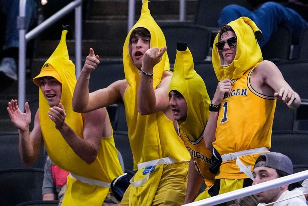 Michigan Wolverines fans celebrate Saturday, March 15, 2025, in a semifinals game at the 2025 TIAA Big Ten Men’s Basketball Tournament between the Michigan Wolverines and the Maryland Terrapins at Gainbridge Fieldhouse in Indianapolis. The Michigan Wolverines defeated the Maryland Terrapins, 81-80.