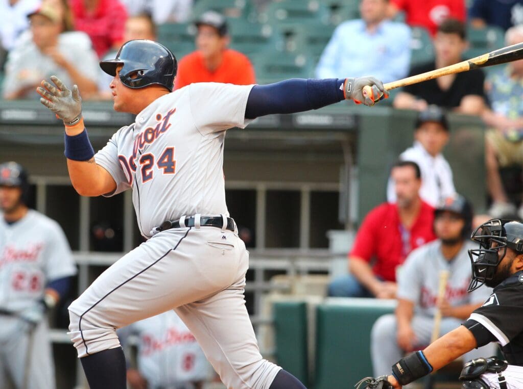 Jun 13, 2016; Chicago, IL, USA; Detroit Tigers first baseman Miguel Cabrera (24) hits an RBI triple during the first inning against the Chicago White Sox at U.S. Cellular Field.