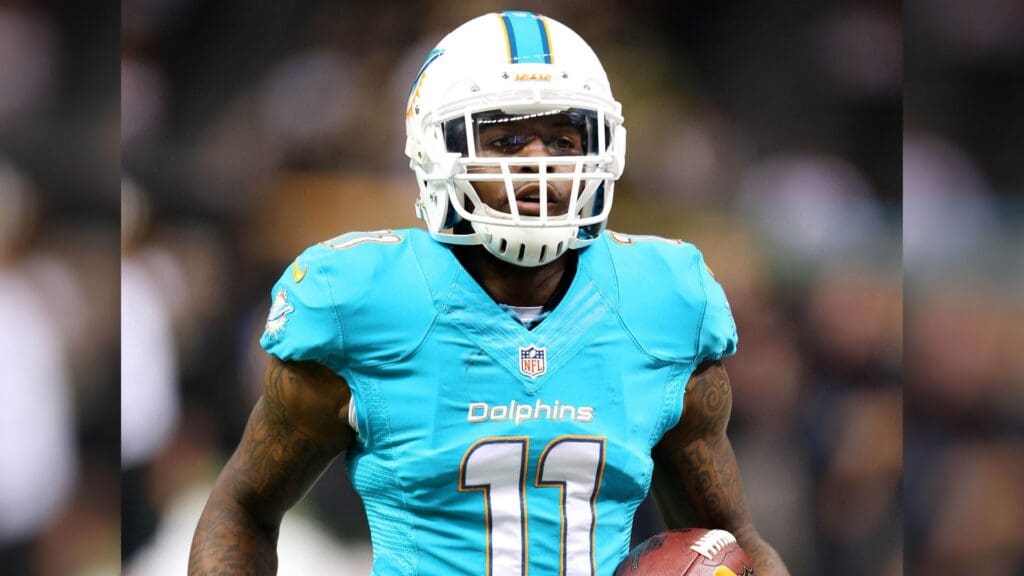 Sep 30, 2013; New Orleans, LA, USA; Miami Dolphins wide receiver Mike Wallace (11) warms up before their game against the New Orleans Saints at the Mercedes-Benz Superdome