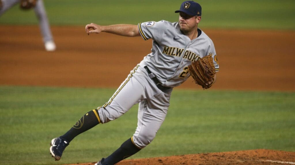 May 7, 2021; Miami, Florida, USA; Milwaukee Brewers starting pitcher Jordan Zimmermann (27) delivers a pitch against the Miami Marlins during the eighth inning at loanDepot park.
