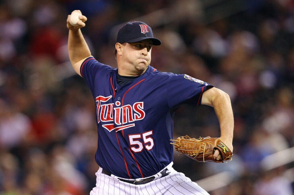 June 12, 2012; Minneapolis, MN, USA: Minnesota Twins relief pitcher Matt Capps (55) delivers a pitch in the ninth inning against the Philadelphia Phillies at Target Field. The Twins won 11-7.