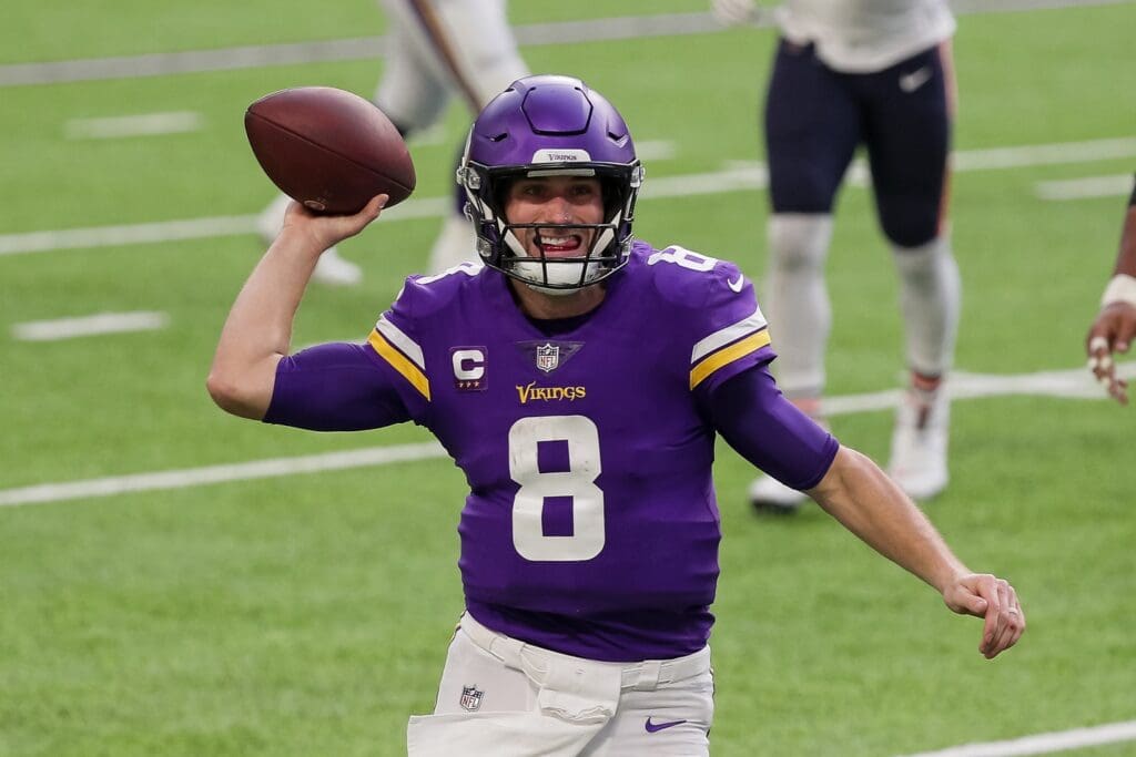 Dec 20, 2020; Minneapolis, Minnesota, USA; Minnesota Vikings quarterback Kirk Cousins (8) throws a pass in the second quarter against the Chicago Bears at U.S. Bank Stadium.