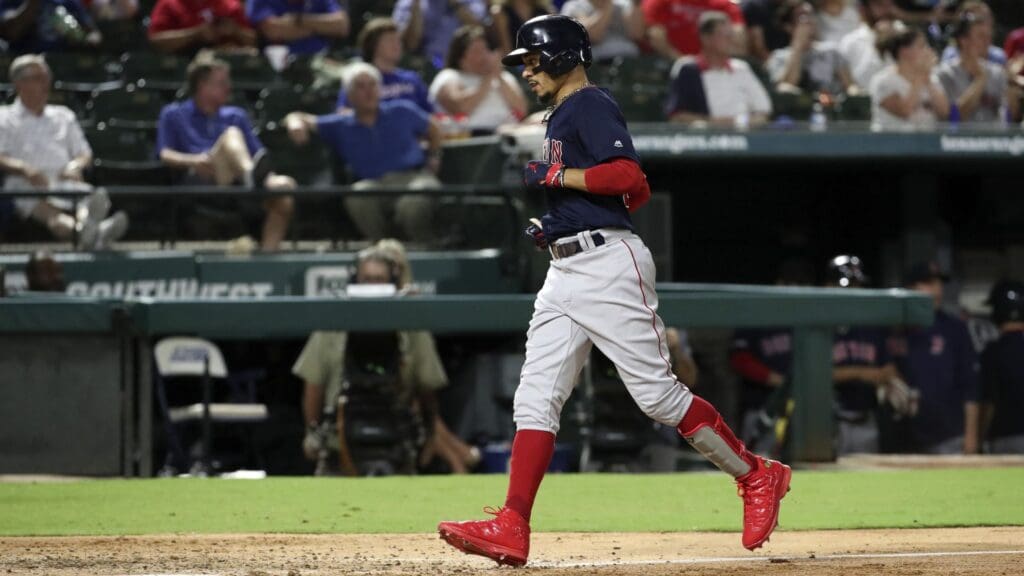 Sep 24, 2019; Arlington, TX, USA; Boston Red Sox right fielder Mookie Betts (50) runs home after hitting a home run during the second inning against the Texas Rangers at Globe Life Park in Arlington.
