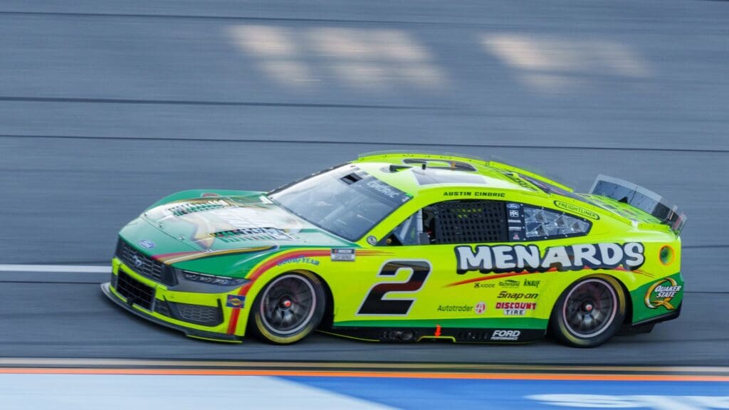 Apr 26, 2025; Talladega, Alabama, USA; NASCAR Cup Series driver Austin Cindric (2) goes into turn one at Talladega Superspeedway.