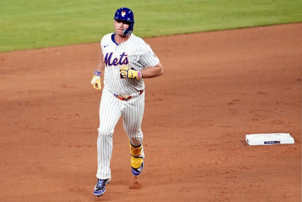 Jul 15, 2025; Cumberland, Georgia, USA; National League first baseman Pete Alonso (20) of the New York Mets hits a three run home run during the sixth inning during the 2025 MLB All Star Game at Truist Park. 