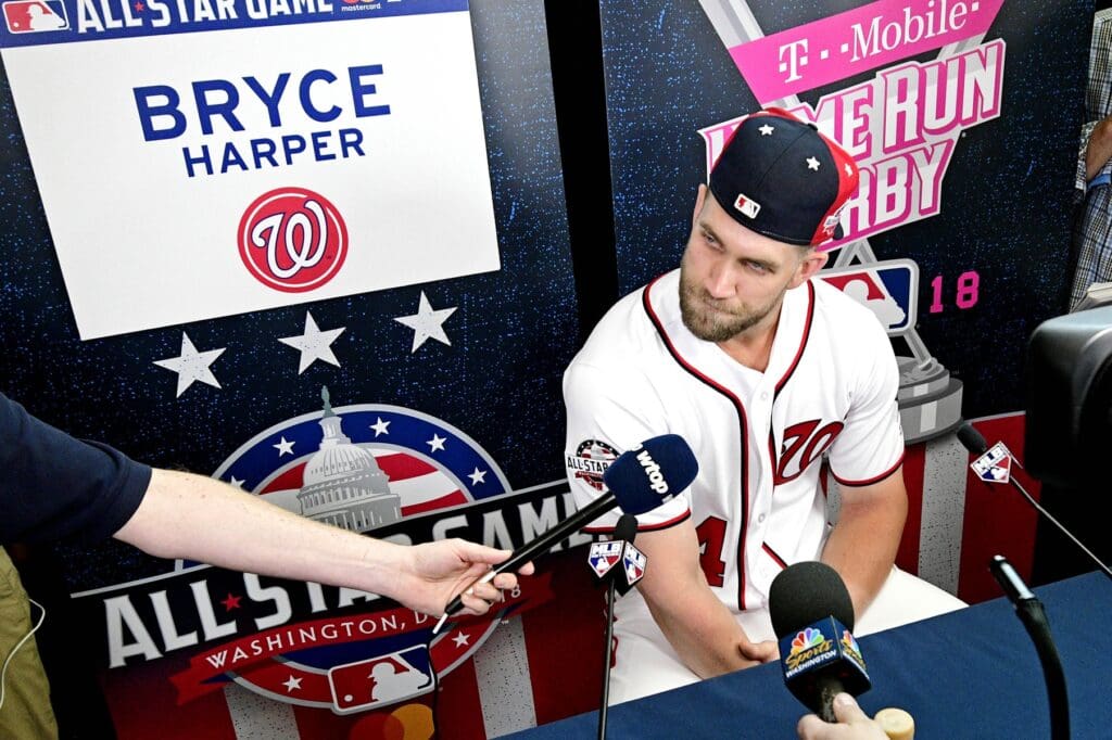 Jul 16, 2018; Washington, DC, USA; National League outfielder Bryce Harper of the Washington Nationals (34) talks with reporters during workouts in preparation for the 2018 MLB All Star Game at Nationals Ballpark. 