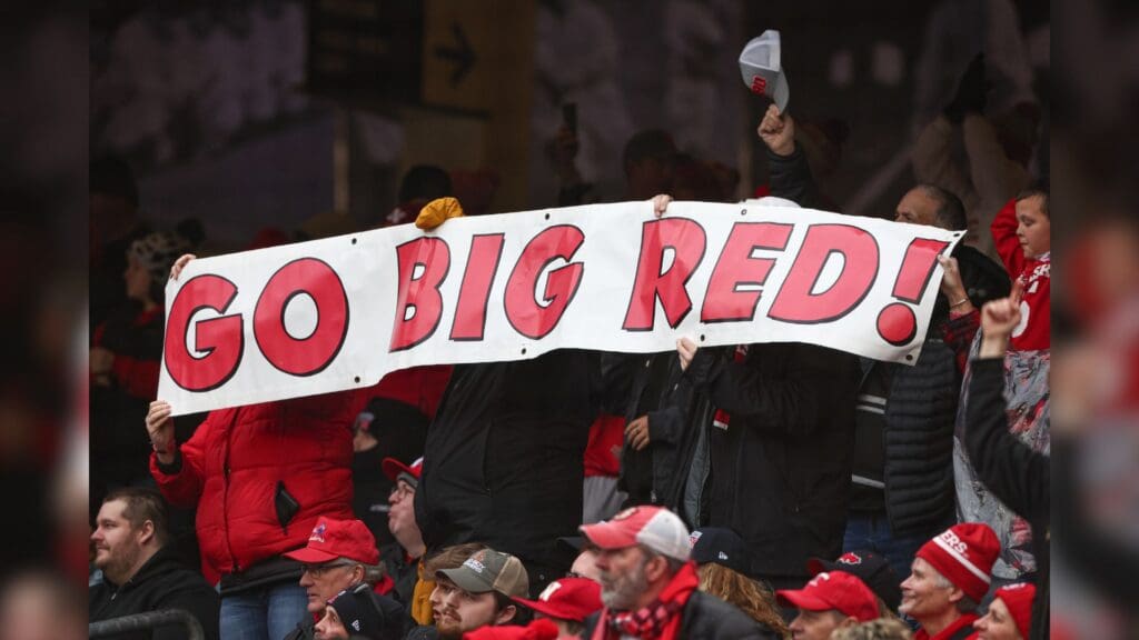 Dec 28, 2024; Bronx, NY, USA; Nebraska Cornhuskers fans hold up a sign during the second half against the Boston College Eagles at Yankee Stadium.