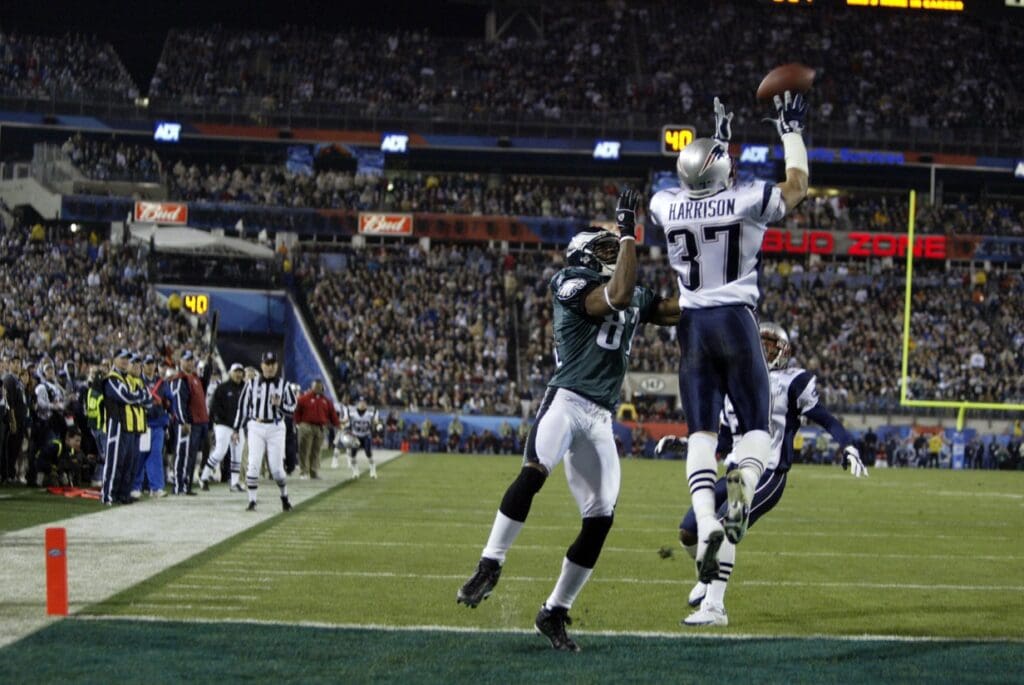 Feb 06, 2005; Jacksonville, FL, USA; New England Patriots defensive back Rodney Harrison (37) defends a pass intended for Philadelphia Eagles receiver Terrell Ownes (81) during Super Bowl XXXIX at Alltel Stadium.