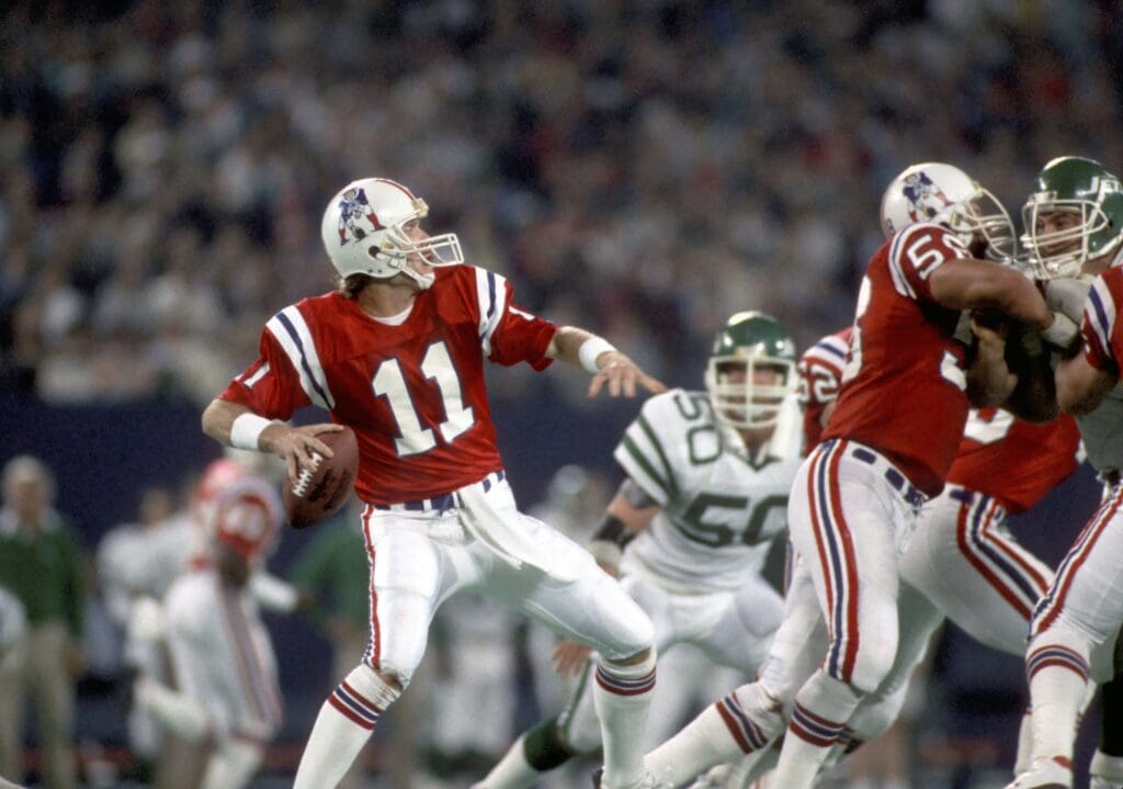 Sep 21, 1987; E. Rutherford, NJ, USA; FILE PHOTO; New England Patriots quarterback (11) Tony Eason in action against the New York Jets at Giants Stadium.