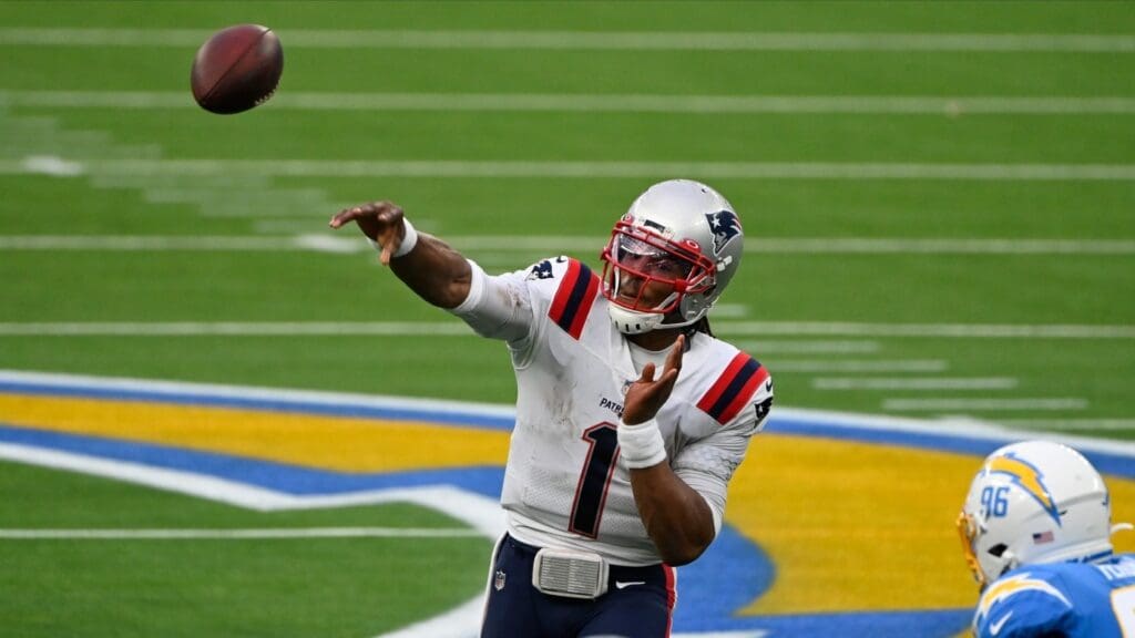 Dec 6, 2020; Inglewood, California, USA; New England Patriots quarterback Cam Newton (1) throws a pass during the second quarter against the Los Angeles Chargers at SoFi Stadium.