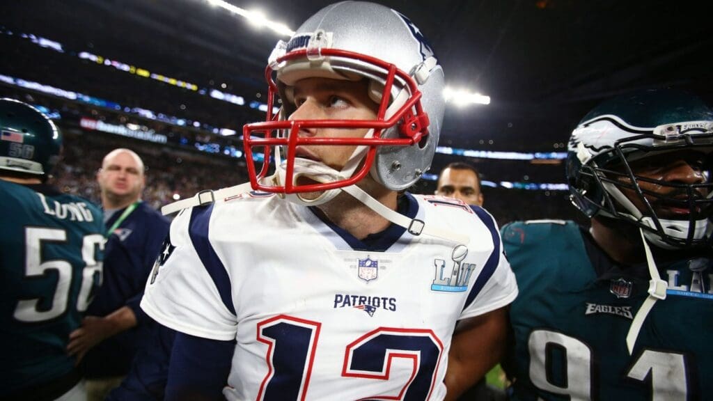 Feb 4, 2018; Minneapolis, MN, USA; New England Patriots quarterback Tom Brady (12) reacts as he walks off the field after Super Bowl LII against the Philadelphia Eagles at U.S. Bank Stadium. 