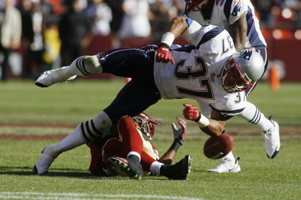 Oct. 5, 2008; San Francisco, CA, USA; New England Patriots safety Rodney Harrison (37) delivers a hit on San Francisco 49ers wide receiver Arnaz Battle (83) in the fourth quarter of the Patriots 30-21 win over the 49ers at Candlestick Park in San Francisco, CA.