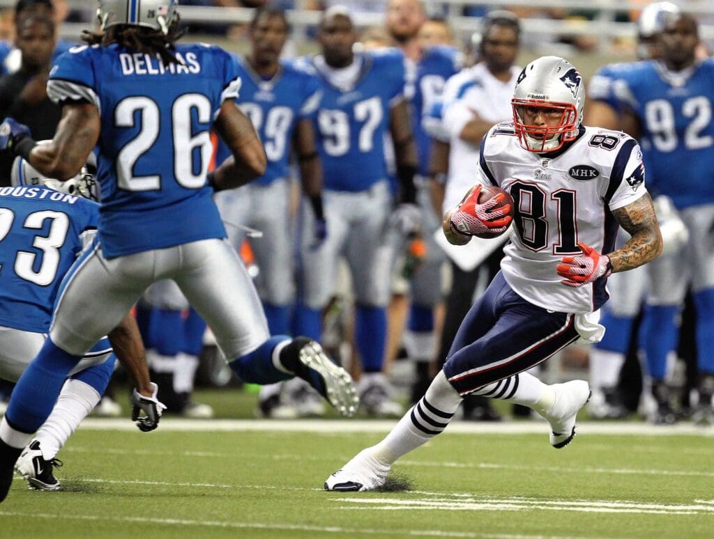 August 27, 2011; Detroit, MI, USA; New England Patriots tight end Aaron Hernandez (81) runs with the ball during the game against Detroit Lions at Ford Field.