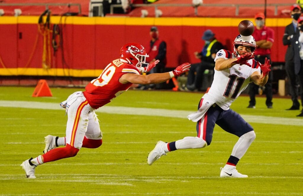 Oct 5, 2020; Kansas City, Missouri, USA; New England Patriots wide receiver Julian Edelman (11) catches a pass against Kansas City Chiefs free safety Daniel Sorensen (49) during the third quarter of a NFL game at Arrowhead Stadium.
