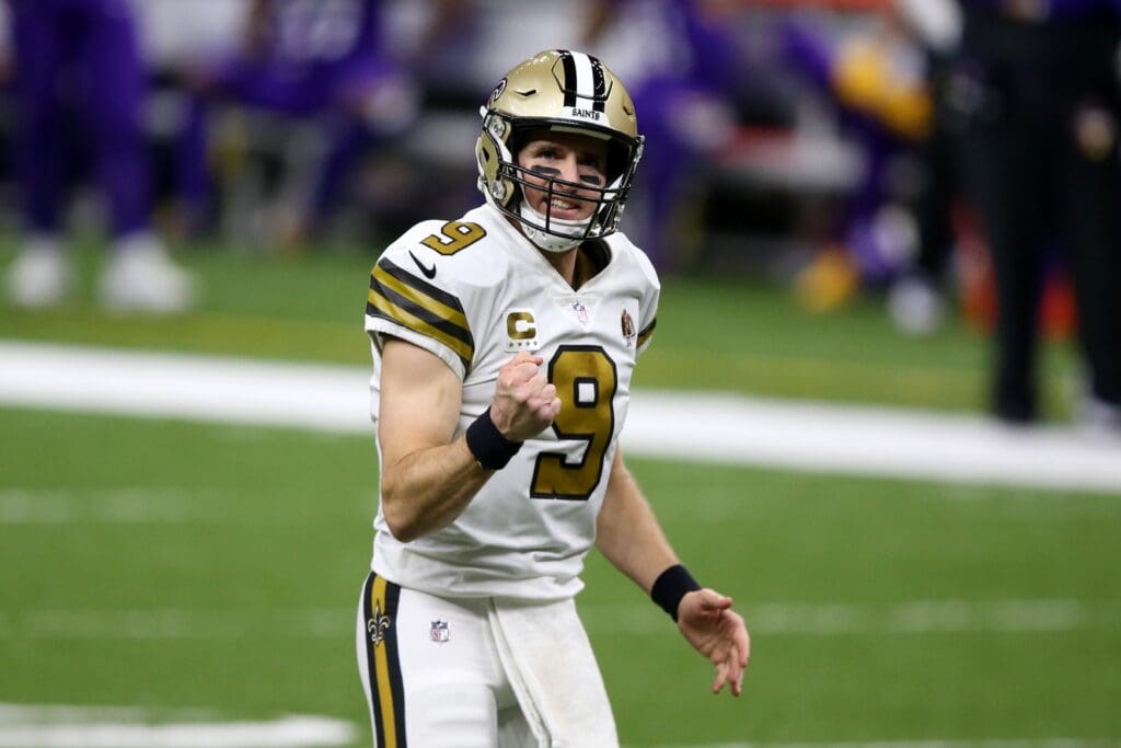 Dec 25, 2020; New Orleans, Louisiana, USA; New Orleans Saints quarterback Drew Brees (9) gestures after a touchdown run by running back Alvin Kamara (41) in the second quarter against the Minnesota Vikings at the Mercedes-Benz Superdome. 