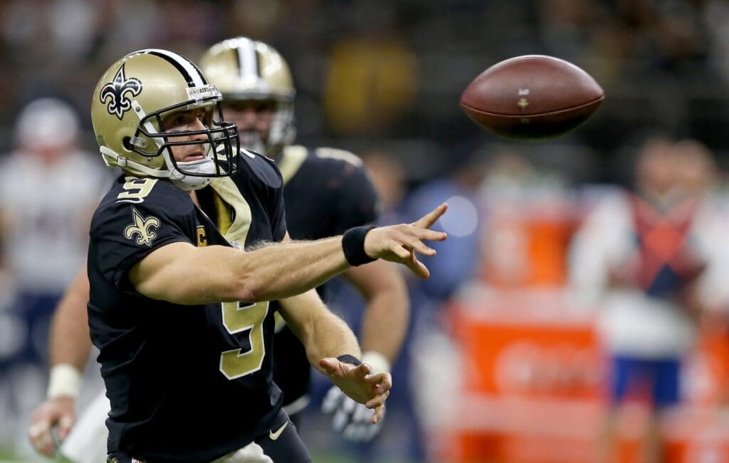 Sep 17, 2017; New Orleans, LA, USA; New Orleans Saints quarterback Drew Brees (9) makes a throw in the second half against the New England Patriots at the Mercedes-Benz Superdome. The Patriots won, 36-20. 