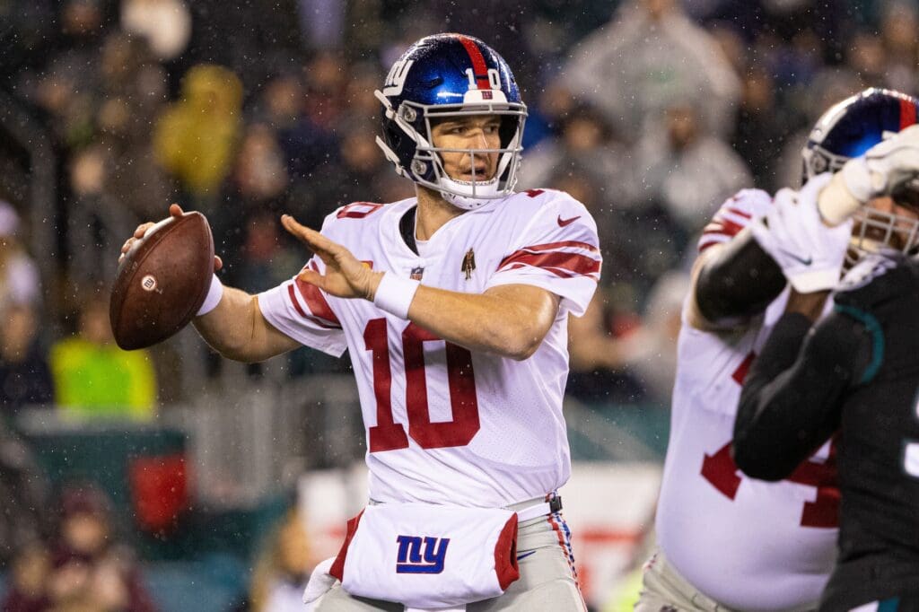 Dec 9, 2019; Philadelphia, PA, USA; New York Giants quarterback Eli Manning (10) passes the ball against the Philadelphia Eagles during the first quarter at Lincoln Financial Field.