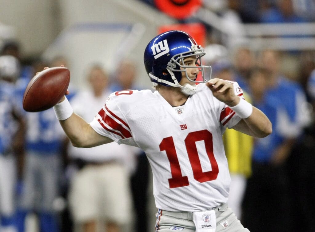 August 7, 2008; Detroit, MI, USA; New York Giants quarterback Eli Manning (10) drops back to pass in the first quarter against the Detroit Lions.
