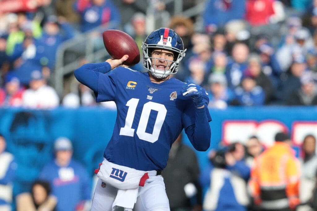 Dec 15, 2019; East Rutherford, NJ, USA; New York Giants quarterback Eli Manning (10) drops back to pass during the first quarter against the Miami Dolphins at MetLife Stadium.