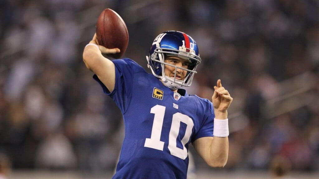 Dec 11, 2011; Dallas, TX, USA; New York Giants quarterback Eli Manning (10) throws prior to the game against the Dallas Cowboys at Cowboys Stadium.