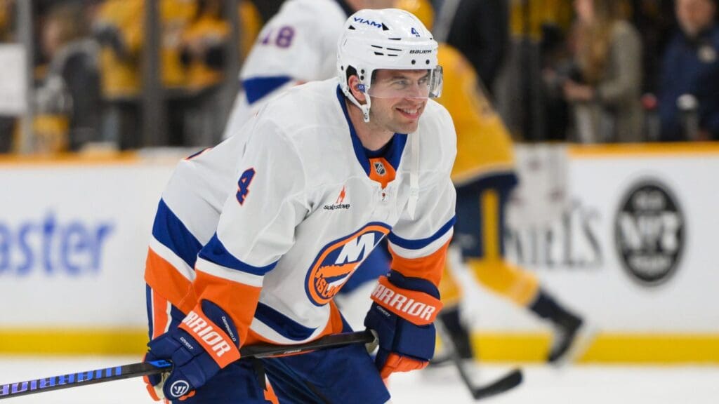 Apr 8, 2025; Nashville, Tennessee, USA; New York Islanders defenseman Tony DeAngelo (4) warms up before a game against the Nashville Predators at Bridgestone Arena.
