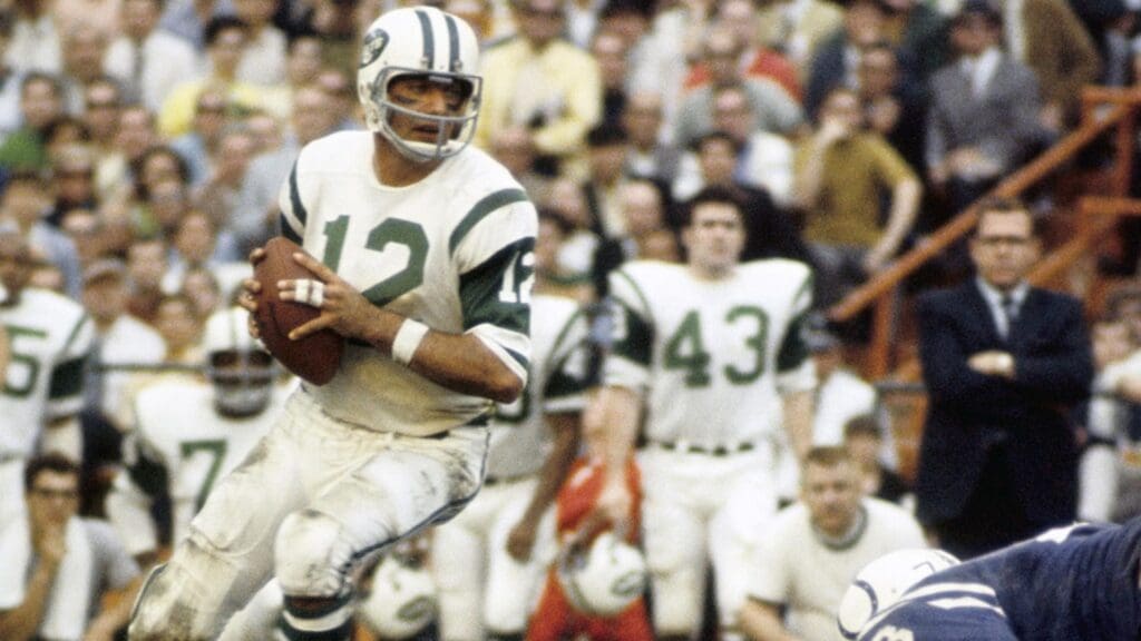 Jan 12, 1969; Miami, FL, USA; FILE PHOTO; New York Jets quarterback Joe Namath (12) looks to throw against the Baltimore Colts during Super Bowl III at the Orange Bowl. The Jets defeated the Colts 16-7.