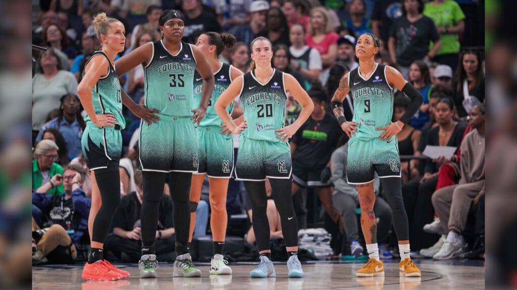 Jul 30, 2025; Minneapolis, Minnesota, USA; New York Liberty guard Sabrina Ionescu (20) and team wait during a timeout against the Minnesota Lynx in the fourth quarter at Target Center.