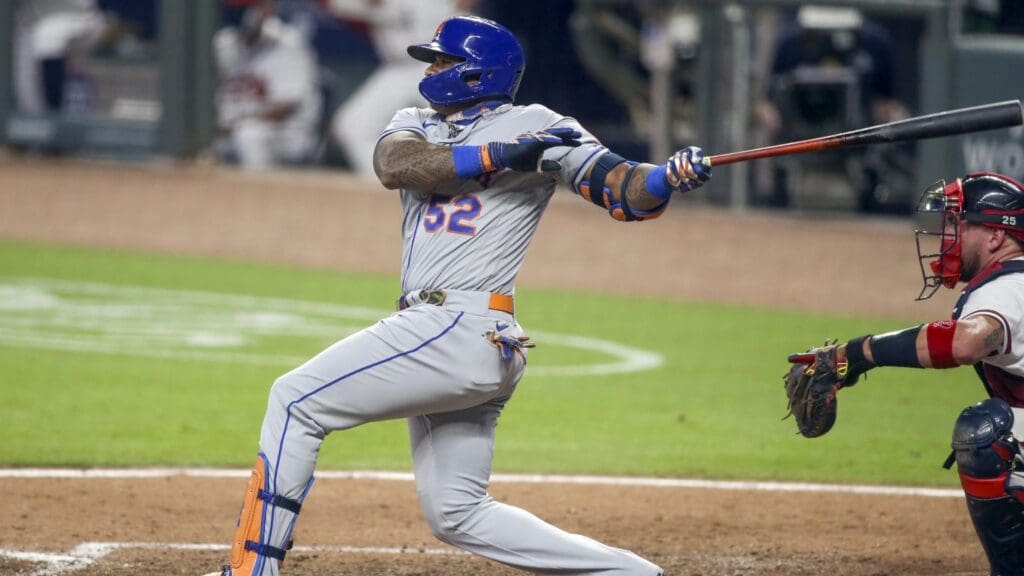 Aug 1, 2020; Atlanta, Georgia, USA; New York Mets left fielder Yoenis Cespedes (52) bats against the Atlanta Braves in the fifth inning at Truist Park.