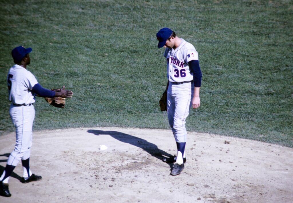 Oct 12, 1969; Baltimore, MD, USA; FILE PHOTO; New York Mets pitcher Jerry Koosman (36) on the mound as Ed Charles (5) reacts against the the Baltimore Orioles during game 2 of the 1969 World Series at Memorial Stadium. The Mets defeated the Orioles 2-1.