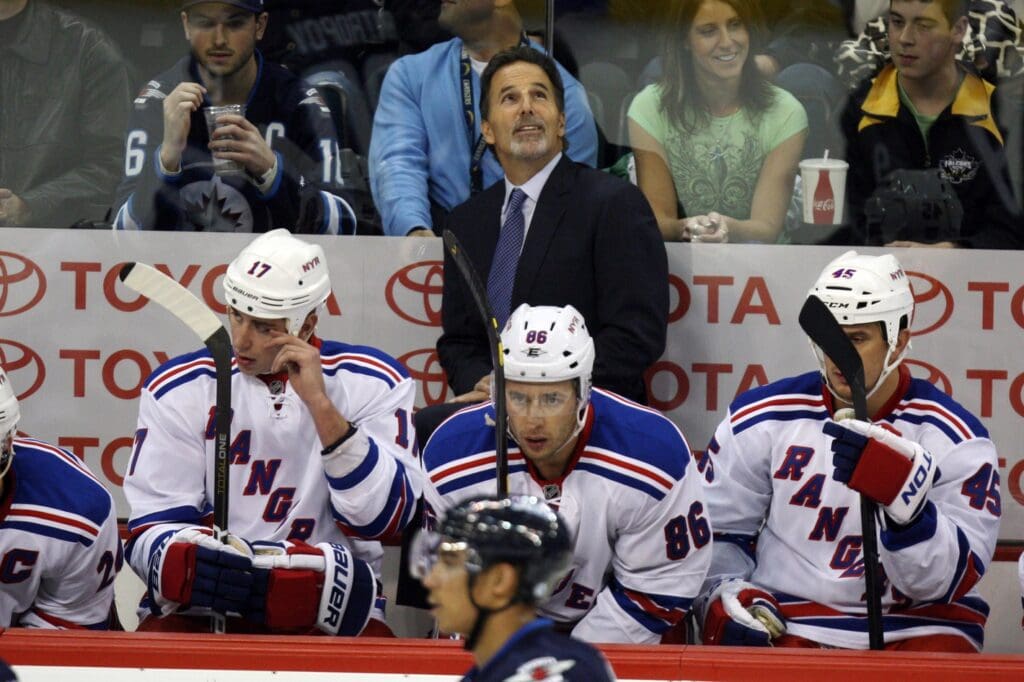 Oct 24, 2011; Winnipeg, MB, CANADA; New York Rangers head coach John Tortorella looks up at the score board during the first period against the Winnipeg Jets at the MTS Centre.