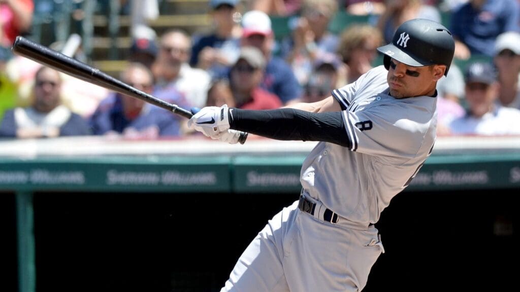 Jul 10, 2016; Cleveland, OH, USA; New York Yankees center fielder Jacoby Ellsbury (22) hits a home run during the second inning against the Cleveland Indians at Progressive Field.