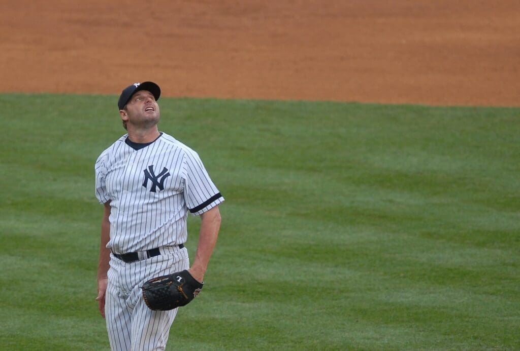 Jun 09, 2007; Bronx, NY, USA; New York Yankees pitcher (22) Roger Clemens reacts against the Pittsburgh Pirates at Yankee Stadium. 