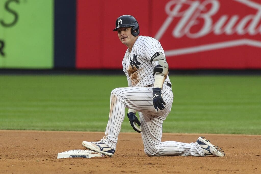 Oct 1, 2022; Bronx, New York, USA; New York Yankees third baseman Josh Donaldson (28) advances to second after after a throw home in the seventh inning against the Baltimore Orioles at Yankee Stadium. 