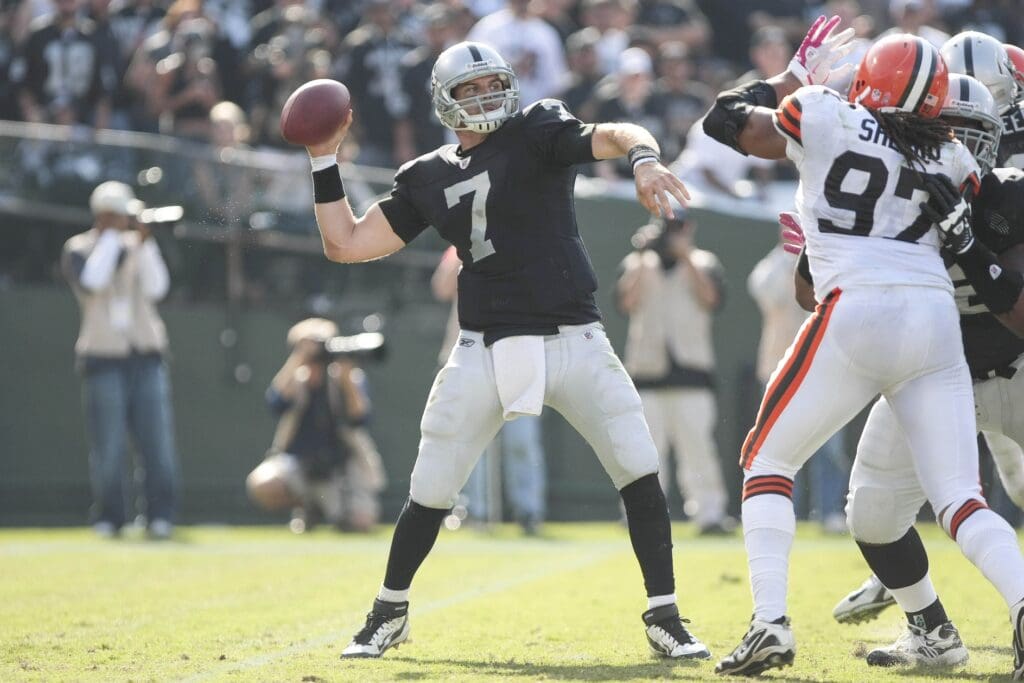 Oct 16, 2011; Oakland CA, USA; Oakland Raiders quarterback Kyle Boller (7) throws the ball ahead of Cleveland Browns defensive end Jabaal Sheard (97) during the fourth quarter at the O.co Coliseum. The Oakland Raiders defeated the Cleveland Browns 24-17.
