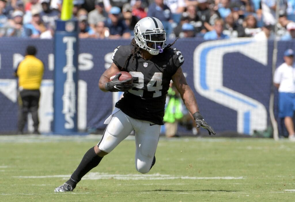 Sep 10, 2017; Nashville, TN, USA; Oakland Raiders running back Marshawn Lynch (24) carries the ball against the Tennessee Titans during the game at Nissan Stadium. The Raiders defeated the Titans 26-16.