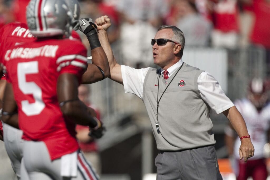 Oct 9, 2010; Columbus, OH, USA; Ohio State Buckeyes head coach Jim Tressel greets his players before the game against Indiana Hoosiers at Ohio Stadium.
