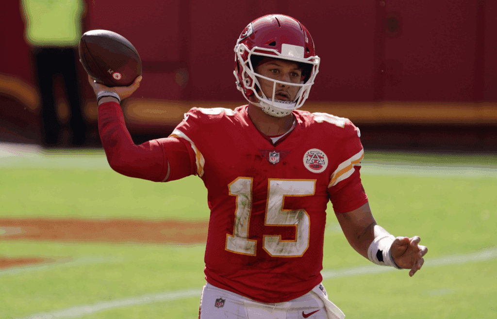 Oct 11, 2020; Kansas City, Missouri, USA; Kansas City Chiefs quarterback Patrick Mahomes (15) throws the ball in the third quarter against the Las Vegas Raiders at Arrowhead Stadium. The Raiders defeated the Chiefs 40-32. 