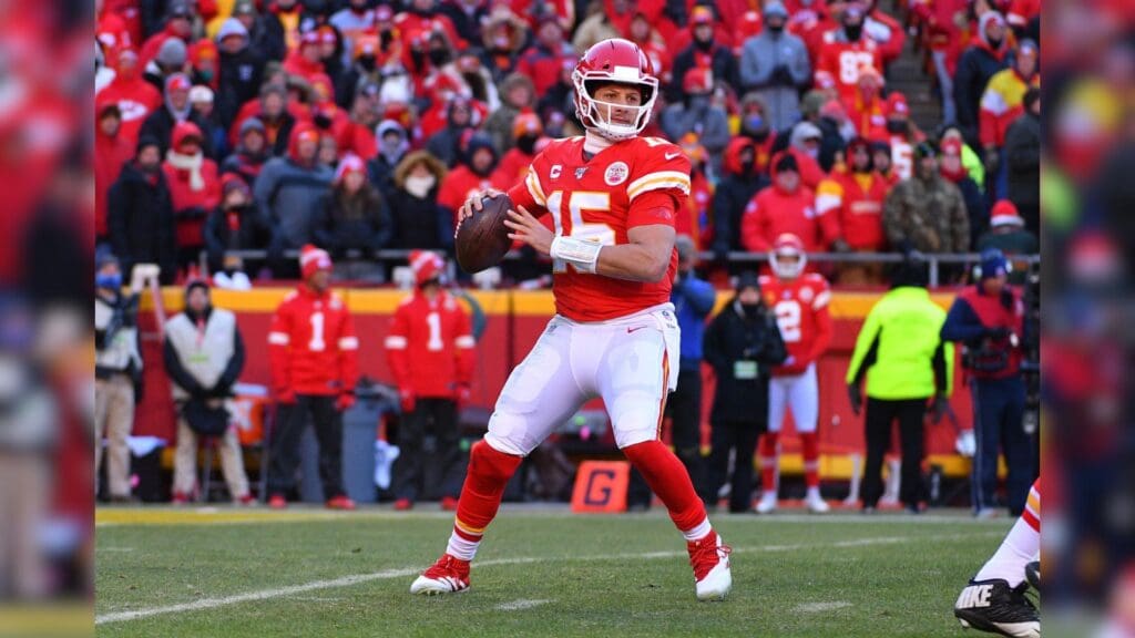 Jan 19, 2020; Kansas City, Missouri, USA; Kansas City Chiefs quarterback Patrick Mahomes (15) drops back to pass during the AFC Championship Game against the Tennessee Titans at Arrowhead Stadium.