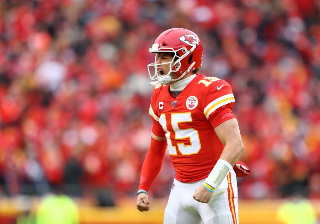 Jan 12, 2020; Kansas City, Missouri, USA; Kansas City Chiefs quarterback Patrick Mahomes (15) celebrates a touchdown against the Houston Texans in the AFC Divisional Round playoff football game at Arrowhead Stadium.