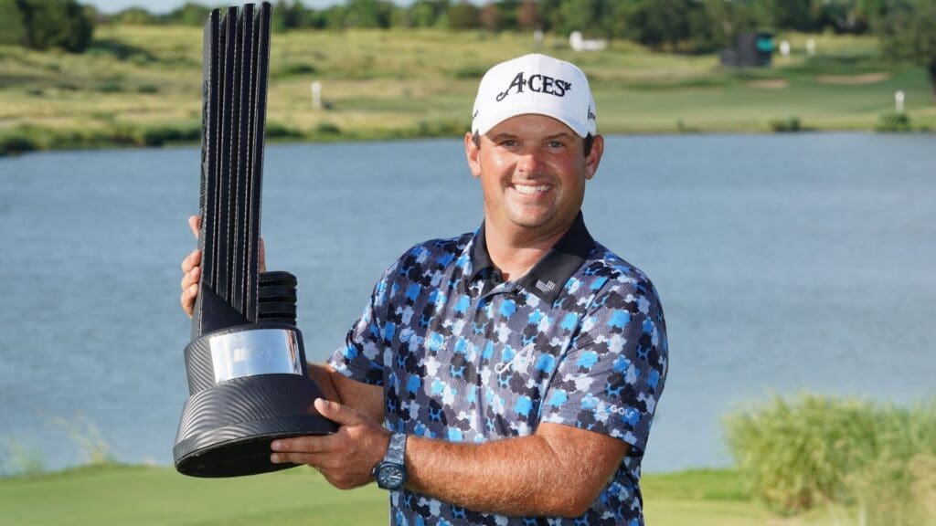 Jun 29, 2025; Carrollton, Texas, USA; Patrick Reed poses with the winner's trophy during the final round of the LIV Golf Dallas golf tournament at Maridoe Golf Club. 