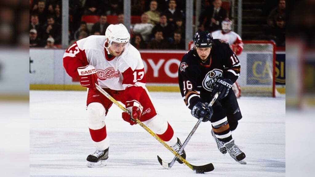 Nov 25, 2002; Detroit, MI, USA; FILE PHOTO; Detroit Red Wings center Pavel Datsyuk (13) in action against Edmonton Oilers right wing Mike York (16) at Joe Louis Arena.