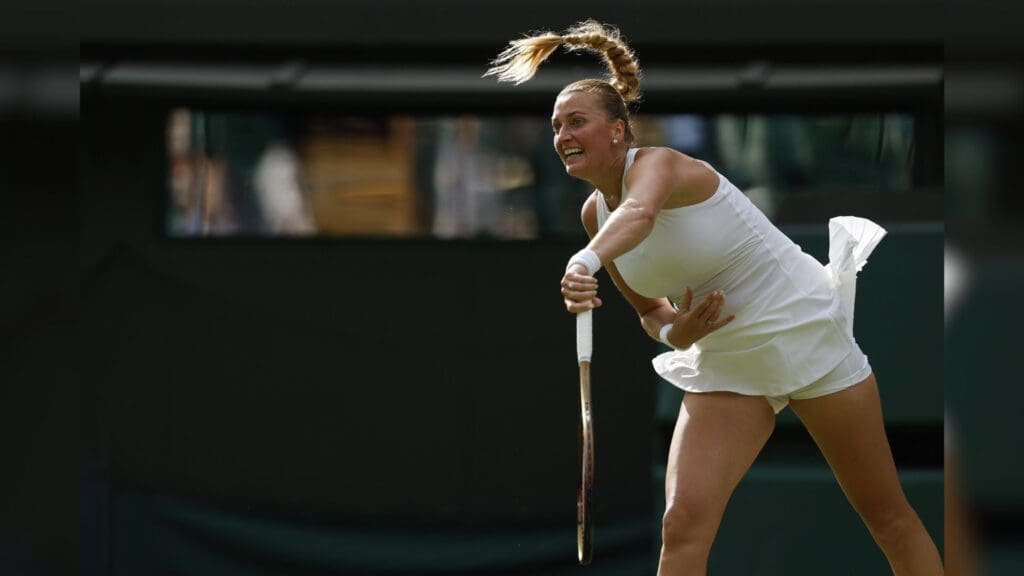 Jul 1, 2025; Wimbledon United Kingdom; Petra Kvitova (CZE) serves against Emma Navarro (USA)(not pictured) on day 2 of The Championships, Wimbledon 2025 at All England Lawn Tennis and Croquet Club.