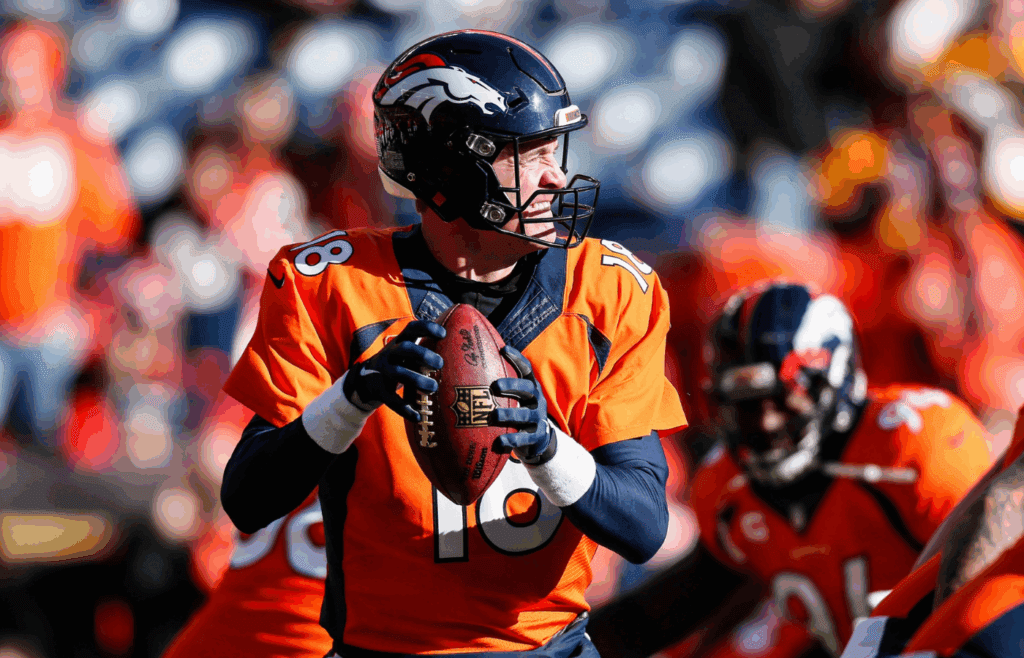 Jan 17, 2016; Denver, CO, USA; Denver Broncos quarterback Peyton Manning (18) warms up prior to the game against the Pittsburgh Steelers in an AFC Divisional round playoff game at Sports Authority Field at Mile High.