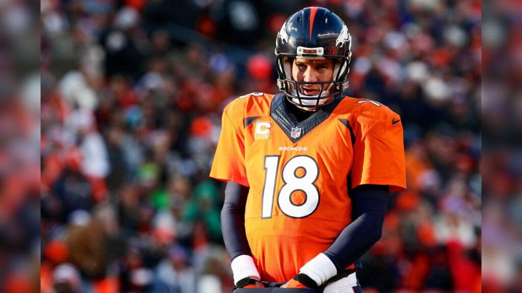 Dec 28, 2014; Denver, CO, USA; Denver Broncos quarterback Peyton Manning (18) in the second quarter against the Oakland Raiders at Sports Authority Field at Mile High. The Broncos defeated the Raiders 47-14.