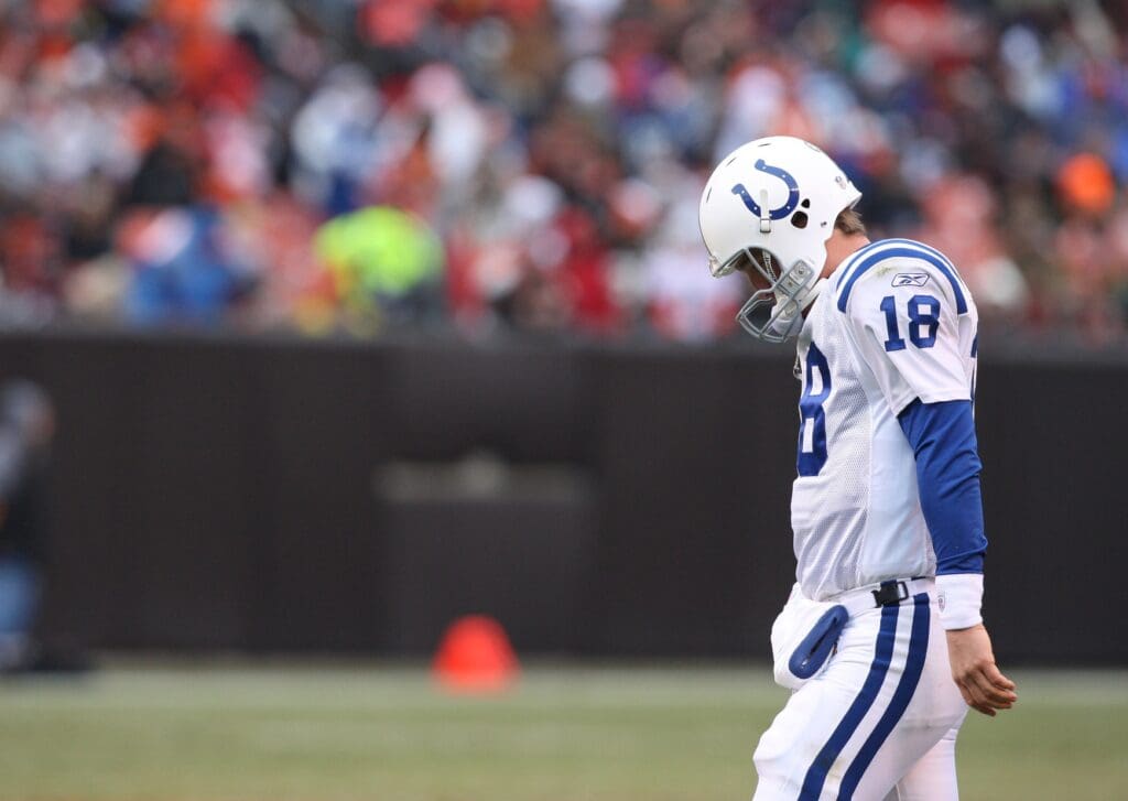 Nov 30, 2008; Cleveland, OH, USA; Indianapolis Colts quarterback Peyton Manning (18) head back to the huddle after a timeout against the Cleveland Browns at Cleveland Browns Stadium.