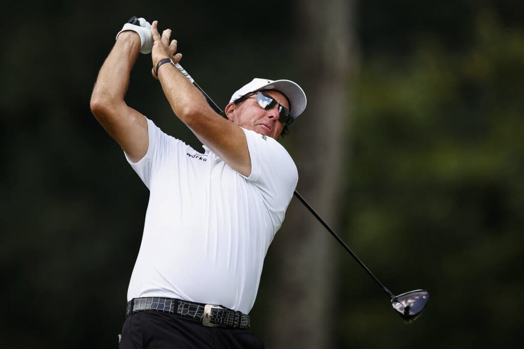 Aug 27, 2021; Owings Mills, Maryland, USA; Phil Mickelson plays his shot from the second tee during the second round of the BMW Championship golf tournament. 